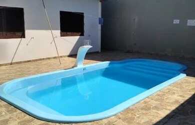 Imagem: A casa possui 5 Dormitórios, 4 Vagas na garagem e está localizado