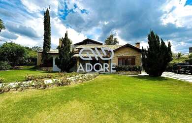 Imagem: A casa em condomínio possui 4 Dormitórios, 5 Banheiros, 5