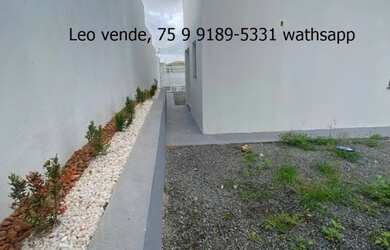 Imagem: A casa possui 2 Dormitórios, 1 Banheiro, 2 Vagas na garagem