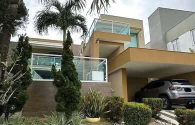 Imagem: A casa em condomínio possui 4 Dormitórios, 5 Banheiros, 4