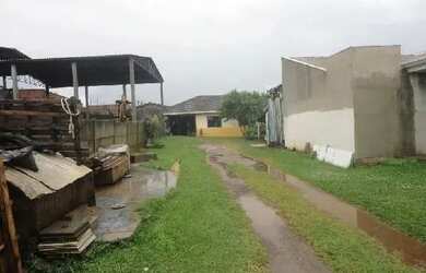 Imagem: A casa possui 2 Dormitórios, 1 Banheiro, 1 Vaga na garagem