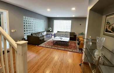 Imagem: A casa possui 3 Dormitórios, 4 Banheiros, 5 Vagas na garagem