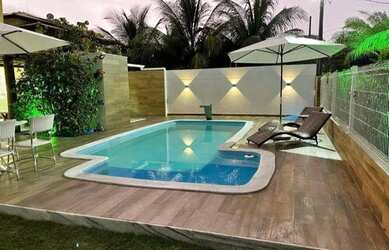 Imagem: A casa possui 4 Dormitórios, 4 Vagas na garagem e está localizado