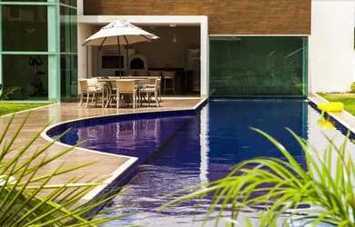 Imagem: A casa possui 3 Dormitórios, 3 Banheiros, 3 Vagas na garagem