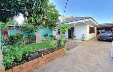 Imagem: A casa possui 2 Dormitórios, 1 Banheiro, 1 Vaga na garagem