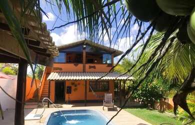 Imagem: A casa possui 3 Dormitórios e 5 Vagas na garagem e está localizado