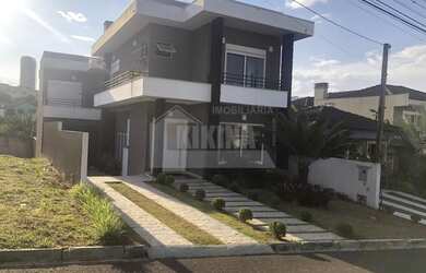 Imagem: A casa possui 3 Dormitórios, 1 Banheiro, 3 Vagas na garagem