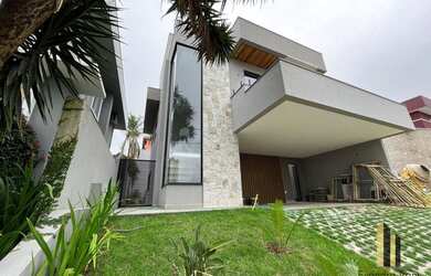 Imagem: A casa em condomínio possui 4 Dormitórios, 5 Banheiros, 2