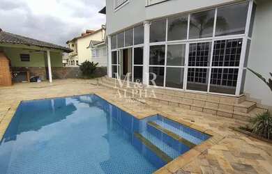 Imagem: A casa em condomínio possui 4 Dormitórios, 5 Banheiros, 4