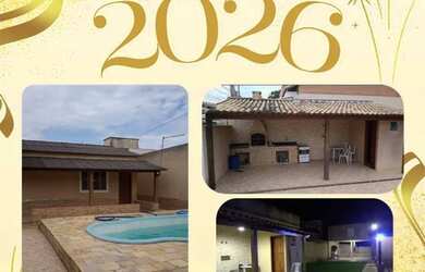 Imagem: A casa possui 4 Dormitórios, Acomodam 20 pessoas, 2 Vagas na