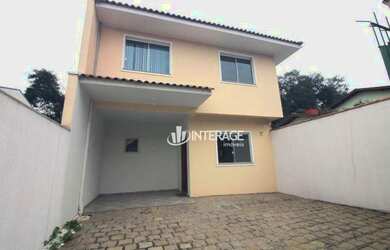 Imagem: A casa possui 3 Dormitórios, 2 Banheiros, 3 Vagas na garagem