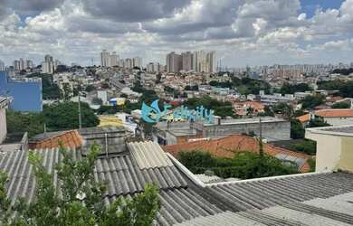 Imagem: A casa possui 2 Dormitórios, 2 Banheiros, 2 Vagas na garagem