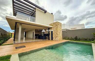 Imagem: A casa em condomínio possui 4 Dormitórios, 5 Banheiros, 4