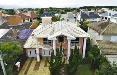 Imagem: A casa em condomínio possui 3 Dormitórios, 4 Banheiros, 2