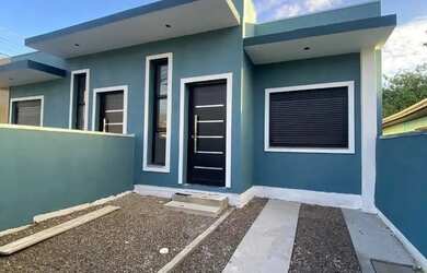 Imagem: A casa possui 3 Dormitórios, 1 Banheiro, 1 Vaga na garagem