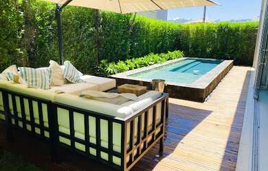 Imagem: A casa em condomínio possui 4 Dormitórios, 5 Banheiros, 4