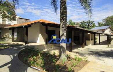 Imagem: A casa possui 3 Dormitórios, 5 Banheiros, 5 Vagas na garagem