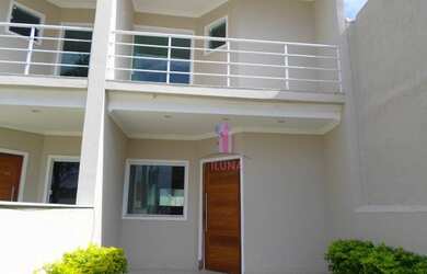 Imagem: A casa possui 2 Dormitórios, 3 Banheiros, 1 Vaga na garagem