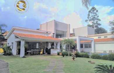 Imagem: A casa em condomínio possui 5 Dormitórios, 4 Banheiros, 3