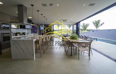 Imagem: A casa em condomínio possui 4 Dormitórios, 5 Banheiros, 5