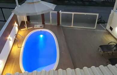 Imagem: A casa em condomínio possui 4 Dormitórios, 5 Banheiros, 2