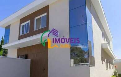 Imagem: A casa possui 3 Dormitórios, 4 Banheiros, 2 Vagas na garagem