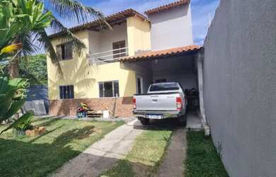 Imagem: A casa e possui 3 Dormitórios, Suítes, Banheiros está localizado