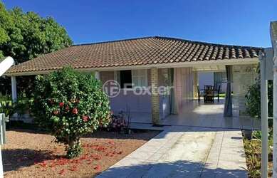 Imagem: A casa em condomínio possui 2 Dormitórios, 2 Banheiros, 5