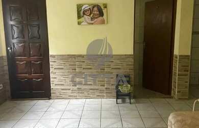 Imagem: A casa possui 4 Dormitórios, 4 Banheiros, 4 Vagas na garagem