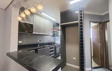 Imagem: O apartamento possui 2 Dormitórios, 1 Banheiro, 1 Vaga na garagem