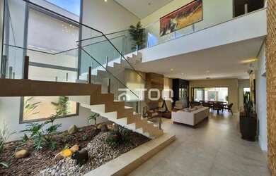 Imagem: A casa em condomínio possui 5 Dormitórios, 5 Banheiros, 407m²