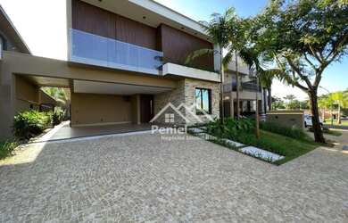 Imagem: A casa em condomínio possui 4 Dormitórios, 5 Banheiros, 4