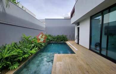 Imagem: A casa possui 3 Dormitórios, 5 Banheiros, 2 Vagas na garagem