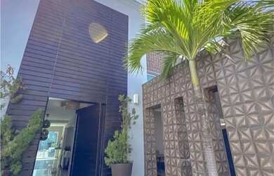 Imagem: A casa em condomínio possui 5 Dormitórios, 5 Banheiros, 2