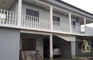 Imagem: A casa possui 5 Dormitórios, 3 Banheiros, 3 Vagas na garagem