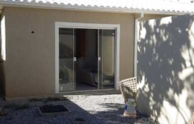 Imagem: A casa possui 2 Dormitórios, 2 Banheiros, 1 Vaga na garagem