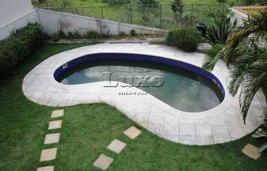 Imagem: A casa em condomínio possui 4 Dormitórios, 5 Banheiros, 2