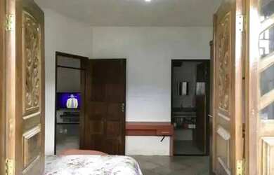 Imagem: A casa possui 2 Dormitórios, 1 Banheiro, 1 Vaga na garagem