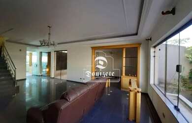 Imagem: A casa possui 3 Dormitórios, 4 Banheiros, 5 Vagas na garagem