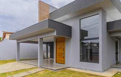 Imagem: A casa possui 3 Dormitórios, 2 Banheiros, 2 Vagas na garagem