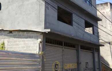 Imagem: A casa possui 2 Dormitórios, 1 Banheiro, 2 Vagas na garagem