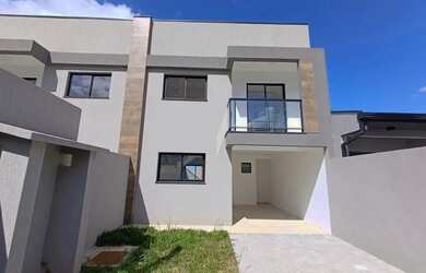 Imagem: A casa possui 3 Dormitórios, 2 Banheiros, 2 Vagas na garagem