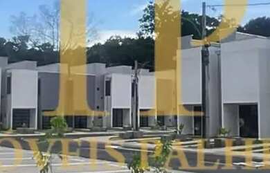 Imagem: A casa em condomínio possui 2 Dormitórios, 3 Banheiros e 59m²