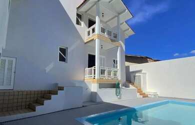 Imagem: A casa possui 5 Dormitórios, 5 Banheiros, 5 Vagas na garagem