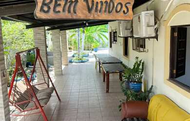 Imagem: A casa possui 4 Dormitórios, 4 Banheiros, 3 Vagas na garagem