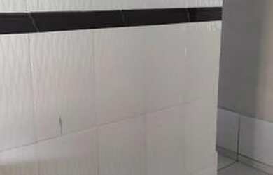 Imagem: A casa possui 3 Dormitórios, 2 Banheiros, 1 Vaga na garagem