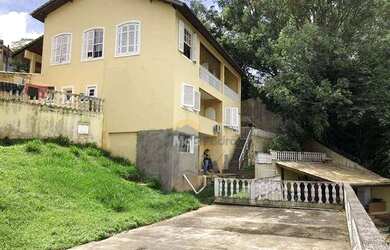 Imagem: A casa possui 5 Dormitórios, 5 Banheiros, 5 Vagas na garagem