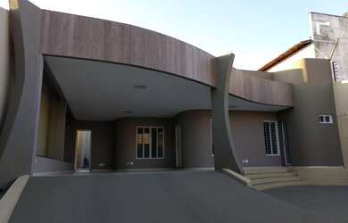 Imagem: A casa possui 3 Dormitórios, 5 Banheiros, 3 Vagas na garagem