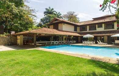 Imagem: A casa em condomínio possui 5 Dormitórios, 5 Banheiros, 5