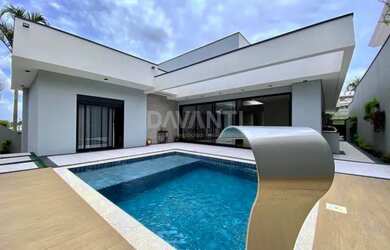 Imagem: A casa em condomínio possui 4 Dormitórios, 5 Banheiros, 5